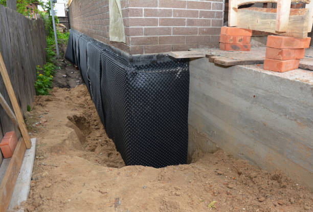 SJ Waterproofing Pros technician performing targeted Waterproofing assessment in Jefferson, OR